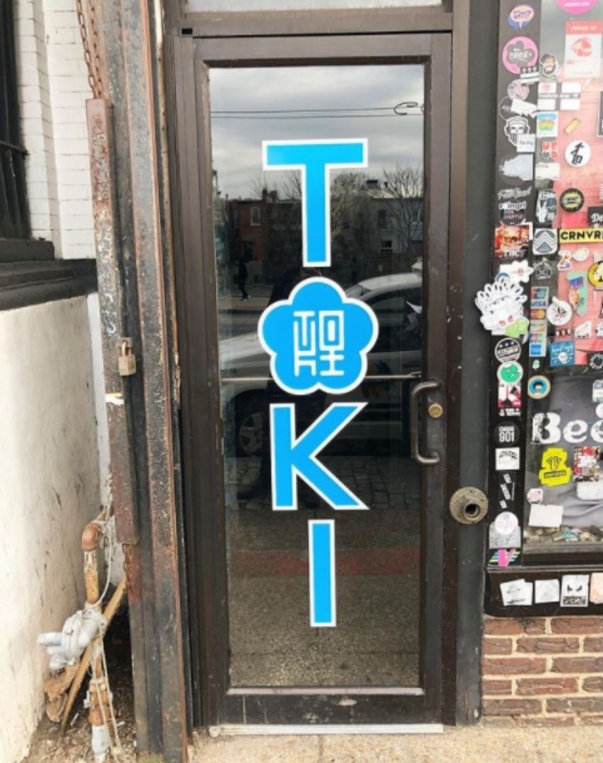 Door of toki underground with blue logo